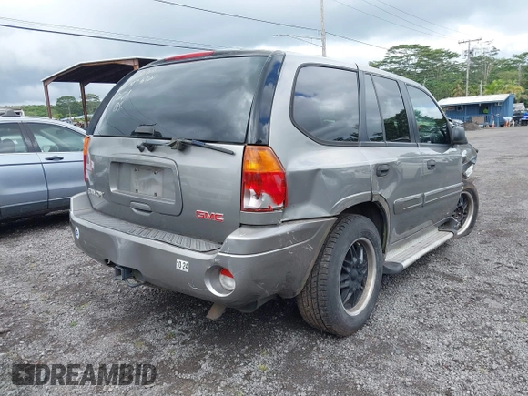 2005 GMC Envoy SLT z VIN 1GKDS13S152161472, wystawiony jako IAAI lot #40110978 z przebiegiem 141 908 mil mil oraz . Historia ofert i sprzedaży dostępna na DreamBid. Obrazek 4.
