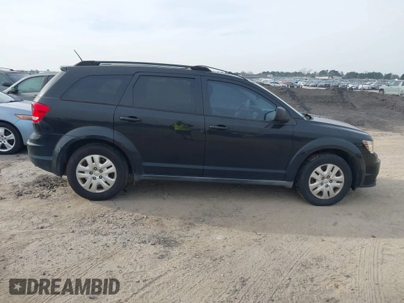 2013 Dodge Journey SE with VIN 3C4PDCAB0DT702977, listed as a IAAI auction lot 41797817 with 150,317 mi miles. Bid and sale history available at carsss.com. Image 14.