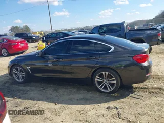2018 BMW 4 Series 430i xDrive with VIN WBA4J3C54JBG95242, listed as a IAAI auction lot 41180565 with 83,710 mi miles and . Bid and sale history available at DreamBid. Image 13.