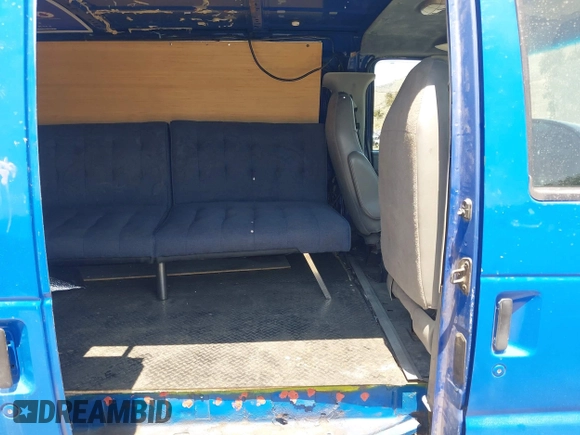 2003 Ford Econoline Cargo with VIN 1FTNE24223HA50404, listed as a IAAI auction lot 42087224 with 210,418 mi miles. Bid and sale history available at carsss.com. Image 8.