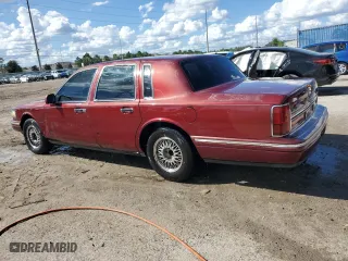 1996 Lincoln Town Car Signature with VIN 1LNLM82W3TY725921, listed as a Copart auction lot 72569054 with 109,073 mi miles and Salvage Title. Bid and sale history available at carsss.com. Image 2.