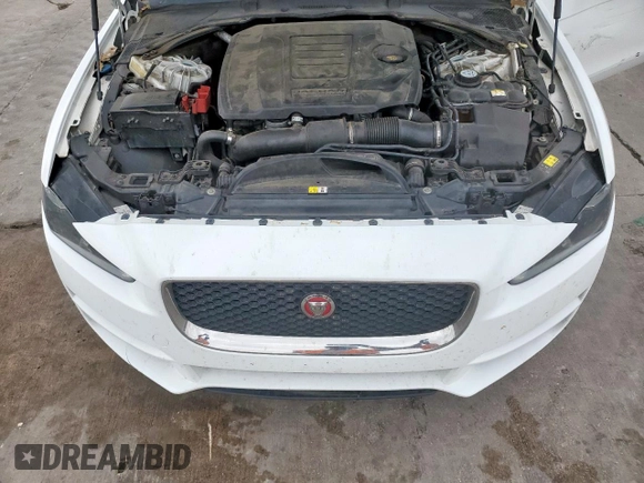 2018 Jaguar XE 25t with VIN SAJAR4FX4JCP31280, listed as a Copart auction lot 50580375 with 125,060 mi miles and Salvage Title. Bid and sale history available at DreamBid. Image 12.