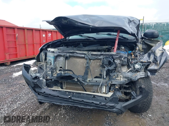 2018 Toyota Tacoma SR z VIN 5TFSX5EN6JX060153, wystawiony jako IAAI lot #41566129 z przebiegiem 33 669 mil mil oraz . Historia ofert i sprzedaży dostępna na DreamBid. Obrazek 13.