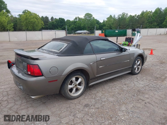 2001 Ford Mustang Deluxe z VIN 1FAFP44411F159656, wystawiony jako IAAI lot #42123128 z przebiegiem 191 814 mil mil oraz . Historia ofert i sprzedaży dostępna na DreamBid. Obrazek 4.