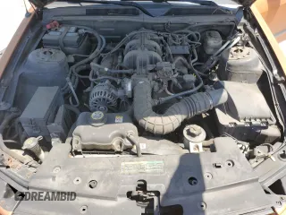 2007 Ford Mustang Deluxe z VIN 1ZVHT80N275227754, wystawiony jako Copart lot #58585035 z przebiegiem 160 466 mil mil oraz Nie do naprawy • Non repairable. Historia ofert i sprzedaży dostępna na DreamBid. Obrazek 11.