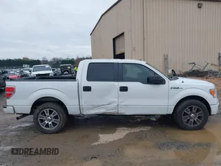 2014 Ford F-150 XL with VIN 1FTFW1CF8EFA66332, listed as a IAAI auction lot 41033667 with 200,513 mi miles. Bid and sale history available at carsss.com. Image 13.