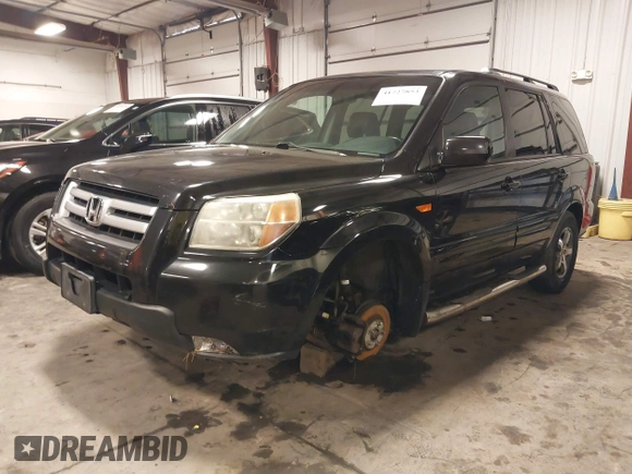 2007 Honda Pilot EX-L with VIN 5FNYF18677B017230, listed as a IAAI auction lot 41727853 with 257,527 mi miles and . Bid and sale history available at DreamBid. Image 2.