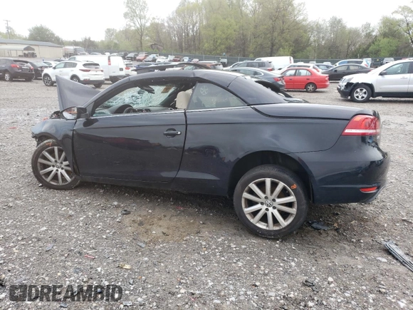 2013 Volkswagen Eos Komfort with VIN WVWBW8AH1DV006523, listed as a Copart auction lot 52037965 with 77,746 mi miles and Salvage Title. Bid and sale history available at DreamBid. Image 2.