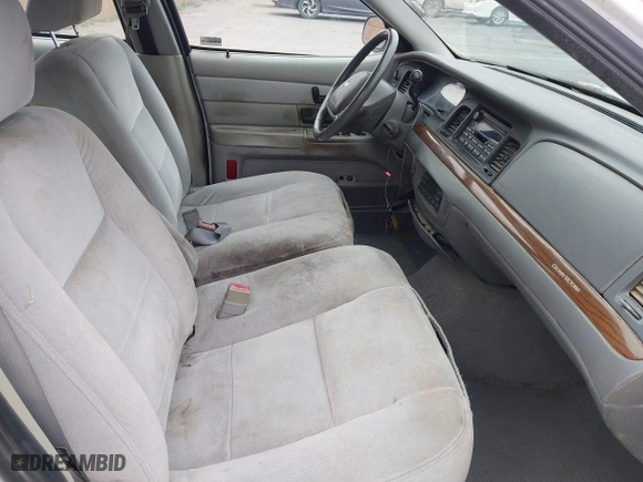2003 Ford Crown Victoria LX with VIN 2FAFP74WX3X154904, listed as a IAAI auction lot 42094274 with 123,579 mi miles. Bid and sale history available at carsss.com. Image 5.