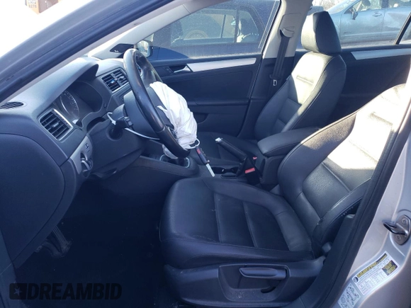 2012 Volkswagen Jetta Sedan TDI with VIN 3VW3L7AJ0CM089765, listed as a Copart auction lot 82358034 with 144,648 mi miles and Salvage Title. Bid and sale history available at carsss.com. Image 7.