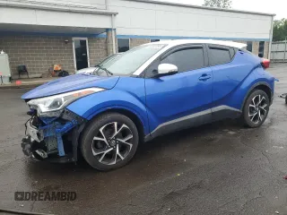 2018 Toyota C-HR XLE z VIN NMTKHMBX1JR005191, wystawiony jako Copart lot #61387095 z przebiegiem 96 786 mil mil oraz Szkoda całkowita • Salvage title. Historia ofert i sprzedaży dostępna na DreamBid. Obrazek 1.