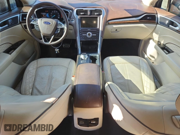 2017 Ford Fusion Titanium z VIN 3FA6P0D96HR251752, wystawiony jako Copart lot #61568705 z przebiegiem 173 479 mil mil oraz Nie do naprawy • Non repairable. Historia ofert i sprzedaży dostępna na DreamBid. Obrazek 8.
