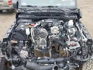 2021 Jeep Gladiator Mojave z VIN 1C6JJTEG9ML605638, wystawiony jako IAAI lot #40302253 z przebiegiem 32 019 mil mil oraz . Historia ofert i sprzedaży dostępna na DreamBid. Obrazek 10.