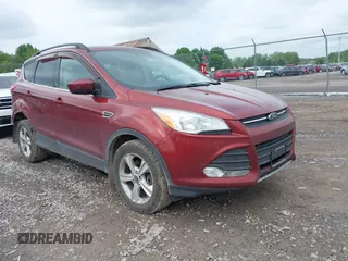 2014 Ford Escape SE z VIN 1FMCU9GX9EUB83211, wystawiony jako IAAI lot #42331133 z przebiegiem 162 807 mil mil oraz . Historia ofert i sprzedaży dostępna na DreamBid. Obrazek 1.
