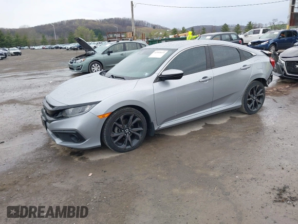 2019 Honda Civic Sport with VIN 19XFC2F81KE034047, listed as a IAAI auction lot 41995614 with 91,303 mi miles and . Bid and sale history available at DreamBid. Image 18.