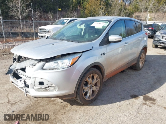 2013 Ford Escape SEL with VIN 1FMCU9H92DUD87086, listed as a IAAI auction lot 41614977 with 100,478 mi miles and . Bid and sale history available at DreamBid. Image 2.