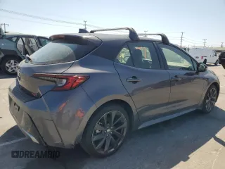 2023 Toyota Corolla Hatchback XSE with VIN JTNC4MBE4P3197390, listed as a Copart auction lot 60291254 with 4,556 mi miles and Salvage Title. Bid and sale history available at carsss.com. Image 3.