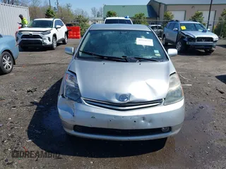 2004 Toyota Prius with VIN JTDKB20U640063062, listed as a IAAI auction lot 41934737 with 257,345 mi miles. Bid and sale history available at carsss.com. Image 6.