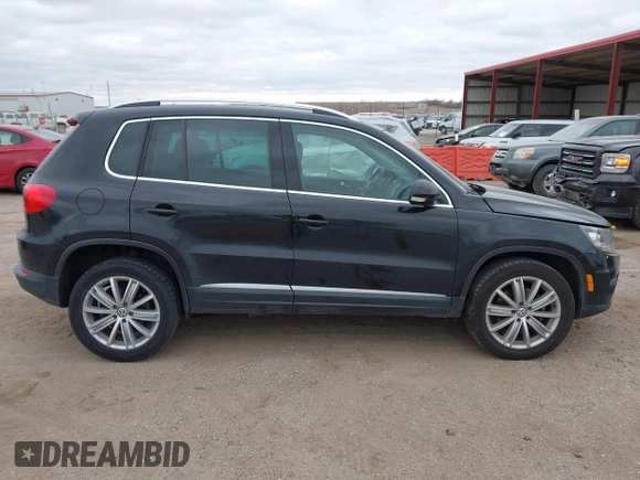 2016 Volkswagen Tiguan S with VIN WVGBV7AX9GW566451, listed as a IAAI auction lot 41393999 with 51,616 mi miles and . Bid and sale history available at DreamBid. Image 14.
