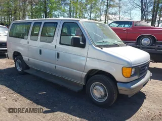 2004 Ford Econoline Passenger XL with VIN 1FBNE31L74HB01176, listed as a IAAI auction lot 42050257 with 128,489 mi miles. Bid and sale history available at carsss.com. Image 1.