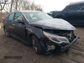 2020 Kia Optima LX with VIN 5XXGT4L33LG384944, listed as a IAAI auction lot 41464556 with 116,412 mi miles. Bid and sale history available at carsss.com. Image 1.