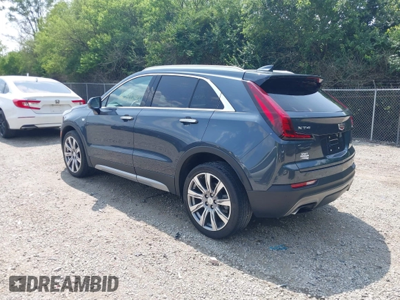 2019 Cadillac XT4 FWD Premium Luxury z VIN 1GYFZCR43KF143980, wystawiony jako IAAI lot #42472400 z przebiegiem 36 496 mil mil oraz . Historia ofert i sprzedaży dostępna na DreamBid. Obrazek 3.