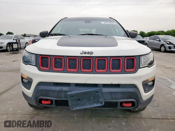 2020 Jeep Compass Trailhawk with VIN 3C4NJDDB3LT189398, listed as a Copart auction lot 59376995 with 75,674 mi miles and Salvage title. Bid and sale history available at DreamBid. Image 5.