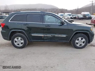 2011 Jeep Grand Cherokee Laredo with VIN 1J4RR4GG9BC546198, listed as a IAAI auction lot 41879387 with 190,973 mi miles. Bid and sale history available at carsss.com. Image 6.