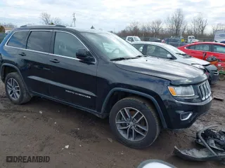 2015 Jeep Grand Cherokee Altitude with VIN 1C4RJFAG8FC897207, listed as a IAAI auction lot 41635417 with 152,382 mi miles. Bid and sale history available at carsss.com. Image 1.
