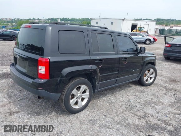 2015 Jeep Patriot Sport with VIN 1C4NJRBB1FD121420, listed as a IAAI auction lot 42344487 with 124,288 mi miles and . Bid and sale history available at DreamBid. Image 4.