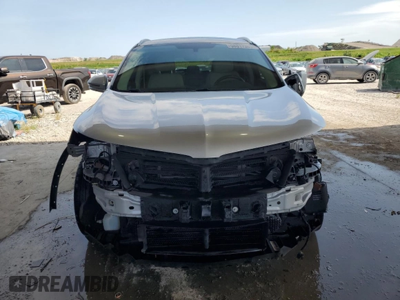 2017 Lincoln MKC Reserve with VIN 5LMCJ3C99HUL14684, listed as a Copart auction lot 58817385 with 77,005 mi miles and Salvage title. Bid and sale history available at DreamBid. Image 5.