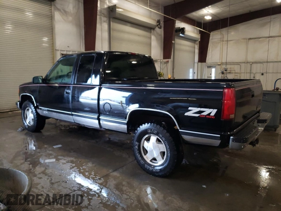 1997 Chevrolet Silverado 1500 with VIN 2GCEK19R4V1278872, listed as a Copart auction lot 51517895 with 250,814 mi miles and Salvage Title. Bid and sale history available at DreamBid. Image 2.