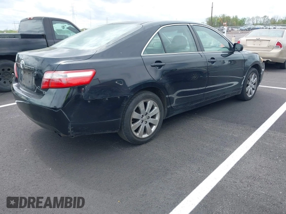 2007 Toyota Camry CE with VIN JTNBE46K473057431, listed as a IAAI auction lot 41941811 with 245,059 mi miles and . Bid and sale history available at DreamBid. Image 4.
