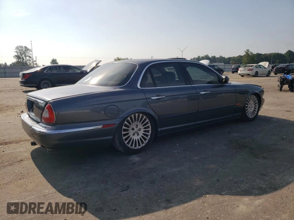 2004 Jaguar XJ with VIN SAJWA71CX4SG32785, listed as a Copart auction lot 69792134 with 183,705 mi miles and Non Repairable. Bid and sale history available at carsss.com. Image 3.
