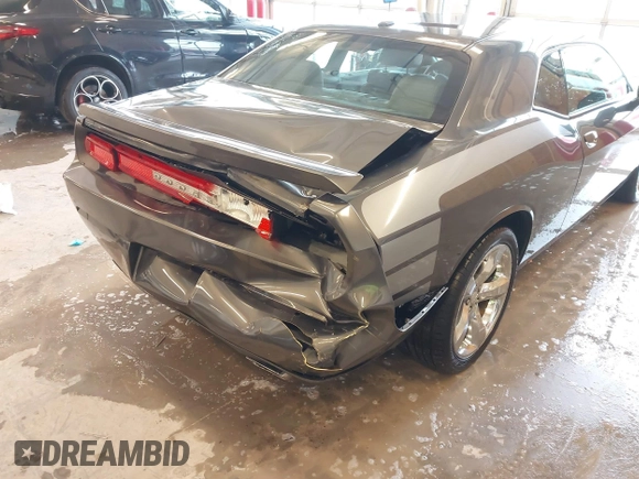 2013 Dodge Challenger SXT z VIN 2C3CDYAG9DH629189, wystawiony jako IAAI lot #41374015 z przebiegiem Nie podano mil oraz . Historia ofert i sprzedaży dostępna na DreamBid. Obrazek 6.