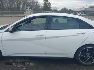 2023 Hyundai Elantra N Line z VIN KMHLR4AFXPU431201, wystawiony jako IAAI lot #41958900 z przebiegiem 38 539 mil mil oraz . Historia ofert i sprzedaży dostępna na DreamBid. Obrazek 14.