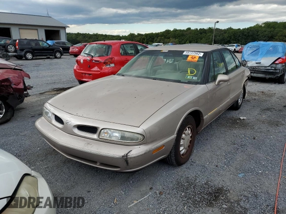 1998 Oldsmobile 88 LS z VIN 1G3HN52K0W4857890, wystawiony jako Copart lot #56019374 z przebiegiem 170 105 mil mil oraz Szkody całkowita. Historia ofert i sprzedaży dostępna na DreamBid. Obrazek 2.
