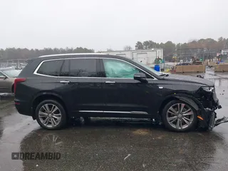2022 Cadillac XT6 Premium Luxury z VIN 1GYKPDRS8NZ161368, wystawiony jako IAAI lot #41115620 z przebiegiem 140 819 mil mil oraz . Historia ofert i sprzedaży dostępna na DreamBid. Obrazek 13.