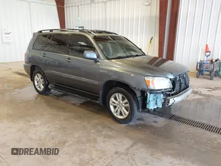 2006 Toyota Highlander Hybrid with VIN JTEDW21AX60002782, listed as a IAAI auction lot 41979903 with 295,778 mi miles. Bid and sale history available at carsss.com. Image 1.