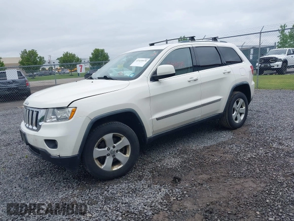 2011 Jeep Grand Cherokee Laredo with VIN 1J4RR4GG6BC680943, listed as a IAAI auction lot 42419575 with 188,672 mi miles and . Bid and sale history available at DreamBid. Image 17.