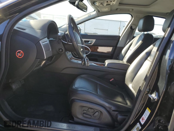 2009 Jaguar XF with VIN SAJWA07C691R20716, listed as a Copart auction lot 89215985 with 62,369 mi miles and Salvage Title. Bid and sale history available at DreamBid. Image 7.
