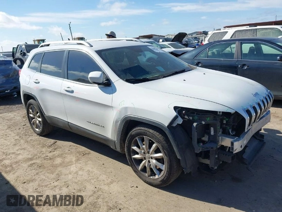 2016 Jeep Cherokee Limited with VIN 1C4PJLDB8GW256788, listed as a IAAI auction lot 41657339 with 104,630 mi miles. Bid and sale history available at carsss.com. Image 1.