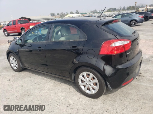 2014 Kia Rio LX with VIN KNADM5A35E6409088, listed as a Copart auction lot 75004804 with 111,664 mi miles and Salvage Title. Bid and sale history available at carsss.com. Image 2.