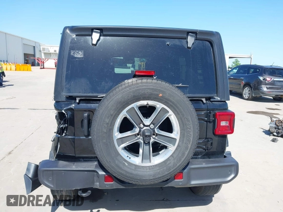 2023 Jeep Wrangler Sahara with VIN 1C4HJXEN5PW508257, listed as a IAAI auction lot 42007569 with 34,990 mi miles and . Bid and sale history available at DreamBid. Image 16.