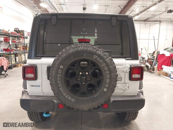 2023 Jeep Wrangler 4xe with VIN 1C4JJXN60PW703757, listed as a IAAI auction lot 41960137 with 38,750 mi miles. Bid and sale history available at carsss.com. Image 17.