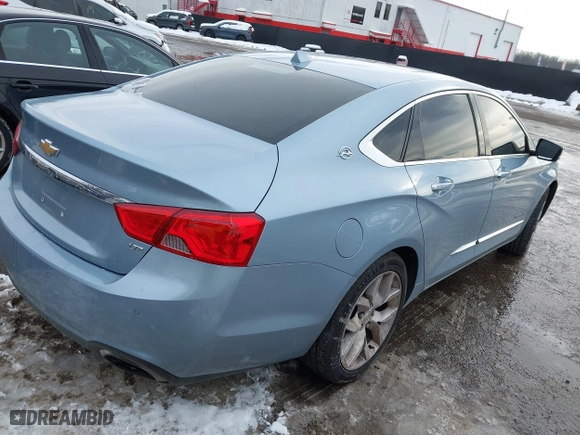 2014 Chevrolet Impala LTZ with VIN 1G1145SL0EU132598, listed as a IAAI auction lot 41264394 with 84,783 mi miles. Bid and sale history available at carsss.com. Image 4.