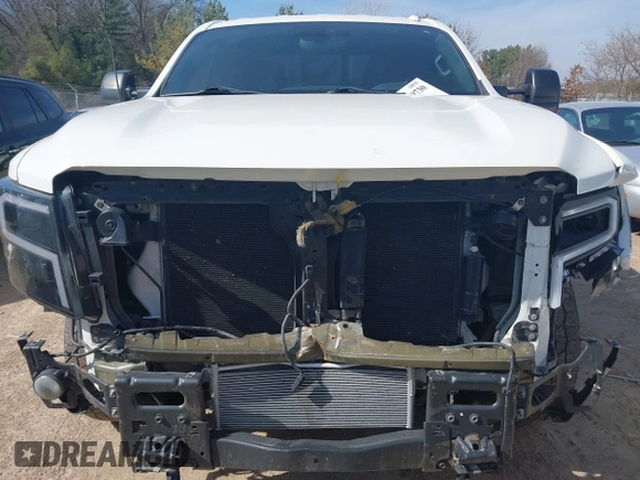 2018 Nissan Titan XD SV with VIN 1N6BA1F40JN523851, listed as a IAAI auction lot 41800730 with 104,527 mi miles. Bid and sale history available at carsss.com. Image 12.