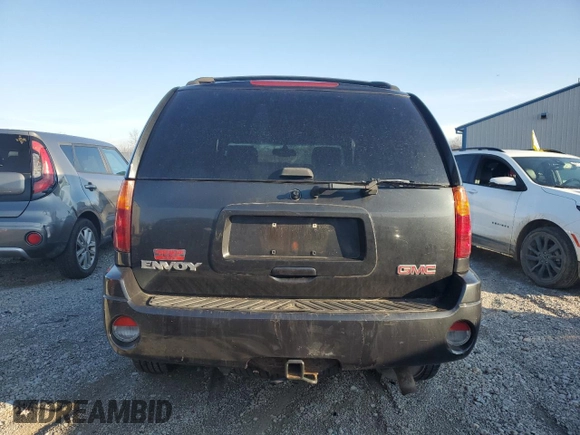 2003 GMC Envoy SLT with VIN 1GKDT13S532288817, listed as a Copart auction lot 85781094 with 0 mi miles and Salvage Title. Bid and sale history available at carsss.com. Image 6.