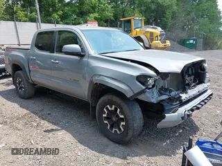 2020 Toyota Tacoma SR5 z VIN 3TMCZ5AN7LM341505, wystawiony jako IAAI lot #42430647 z przebiegiem 73 285 mil mil oraz . Historia ofert i sprzedaży dostępna na DreamBid. Obrazek 1.