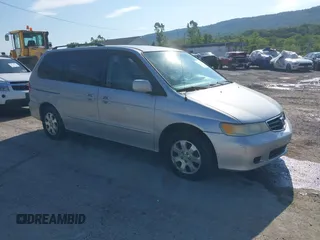 2004 Honda Odyssey EX z VIN 5FNRL18614B037143, wystawiony jako IAAI lot #42362262 z przebiegiem 203 023 mil mil oraz . Historia ofert i sprzedaży dostępna na DreamBid. Obrazek 1.